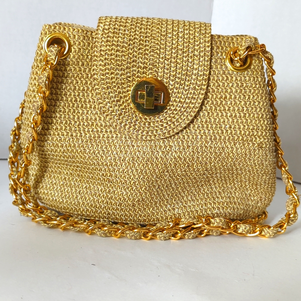 Evening purse, Gold colored with gold chain. 8.5 x 7 x 4 inches.